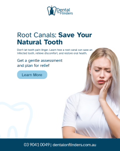 Woman holding her cheek in pain, indicating a toothache or infection.